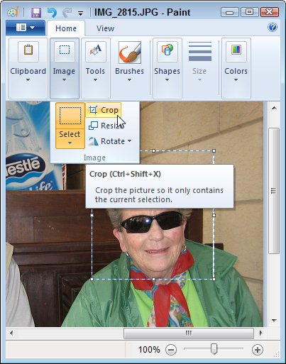 Windows 7's built-in Paint program can crop photos.