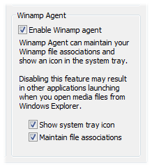 Uncheck "Winamp Agent" to keep Winamp from being the default program.